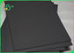 300 - 350 GSM One Side Coated Glossy Black Cardboard Untuk Pengemasan Kotak
